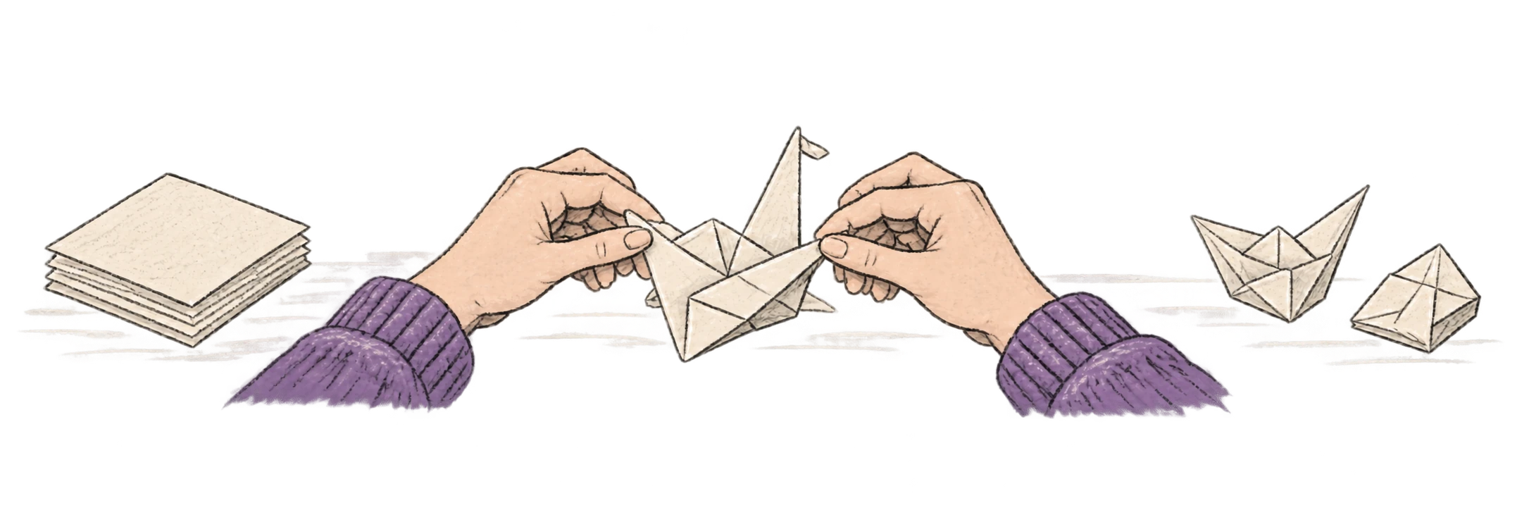 Hands transform paper into a new form.